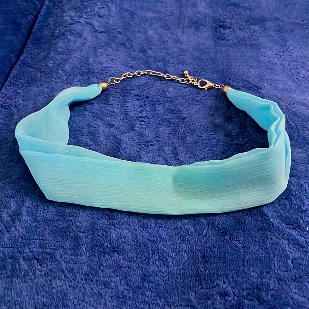 Blue fabric headband with silver clasp